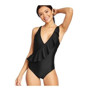Kona sol asymmetrical ruffle high coverage black one piece swimsuit
